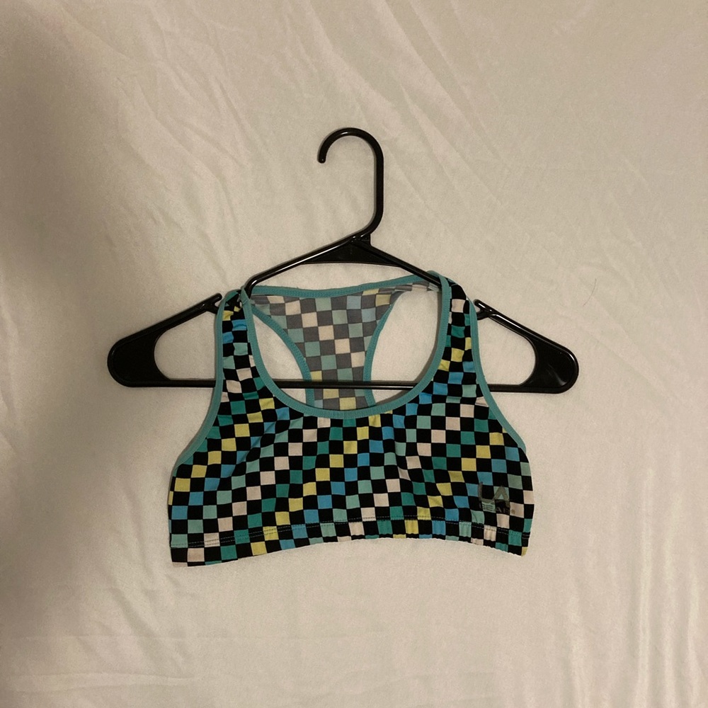 It is a sport bra black, blue, green and yellow size small